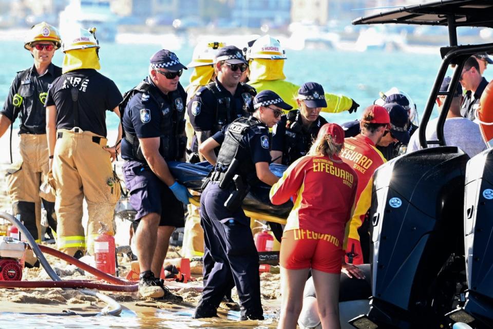 Emergency workers at the scene (AP)