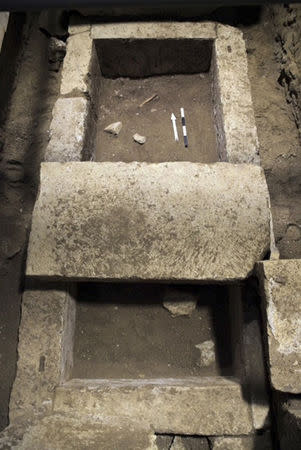 A grave is seen inside the site of an archaelogical excavation at the town of Amphipolis, in northern Greece, in this handout photo taken November 7, 2014, and distributed by Greece's Culture Ministry on November 12, 2014. REUTERS/Hellenic Culture Ministry/Handout via Reuters