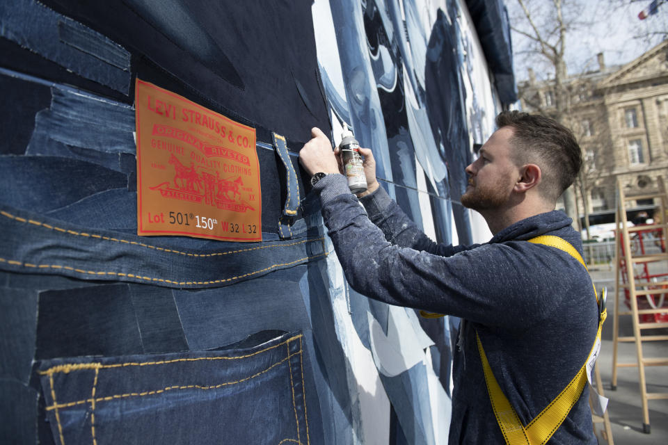 Berry assembling the mural at Paris’ Place de la Republique.