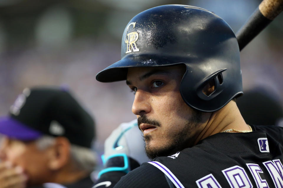 LOS ANGELES, CA - SEPTEMBER 03: Colorado Rockies Third base Nolan Arenado (28) holds a bat in a dugout during a MLB game between the Colorado Rockies and the Los Angeles Dodgers on September 3, 2019 at Dodger Stadium in Los Angeles, CA. (Photo by Kiyoshi Mio/Icon Sportswire via Getty Images)