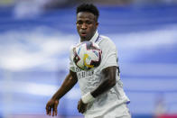 Real Madrid's Vinicius Junior controls the ball during their Spanish La Liga soccer match against Athletic Bilbao at the Santiago Bernabeu stadium in Madrid, Sunday, June 4, 2023. (AP Photo/Bernat Armangue)