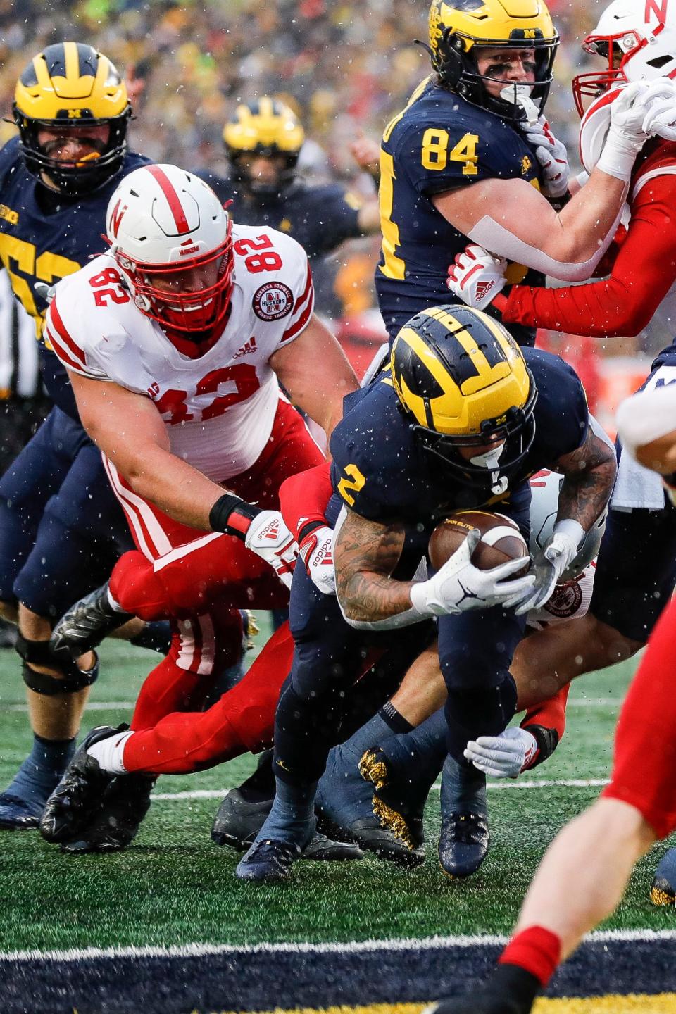 Michigan running back Blake Corum (2) rushes into the end zone for a touchdown against Nebraska during the first half at Michigan Stadium in Ann Arbor on Saturday, Nov. 12, 2022.