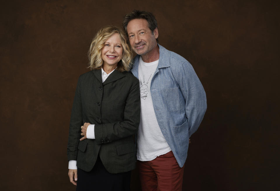 Actor-director Meg Ryan, left, poses with co-star David Duchovny at the Four Seasons Hotel in Los Angeles on Wednesday, Oct. 25, 2023, to promote their film "What Happens Later." (AP Photo/Chris Pizzello)