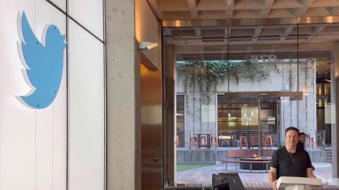 This image from the Twitter page of Elon Musk shows Musk entering Twitter headquarters carrying a sink through the lobby area on Wednesday, Oct. 26, 2022 in San Francisco. (Twitter page of Elon Musk via AP)