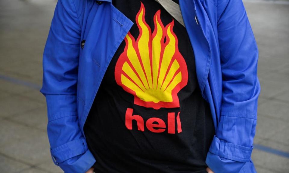 A protester from Fossil Free London demonstrates outside Shell’s AGM at ExCeL.