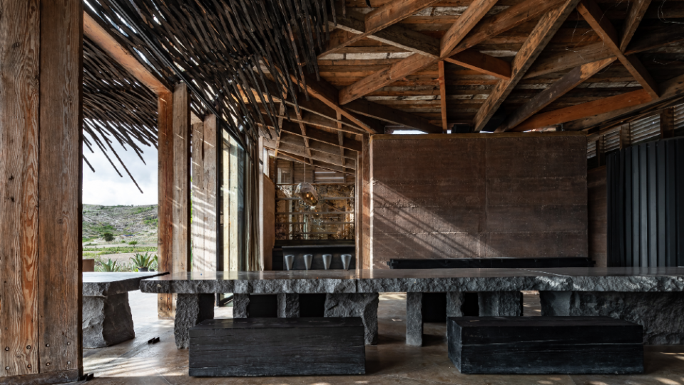 The restaurant’s communal table was made from a 17-ton slab of basalt stone. - Credit: Courtesy Casa Silencio