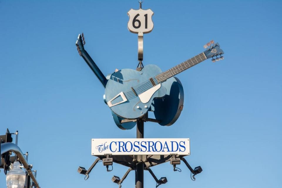 Crossroads monument featuring three giant blue guitars marking the intersection where blues legend Robert Johnson sold his soul to the devil in Clarksdale