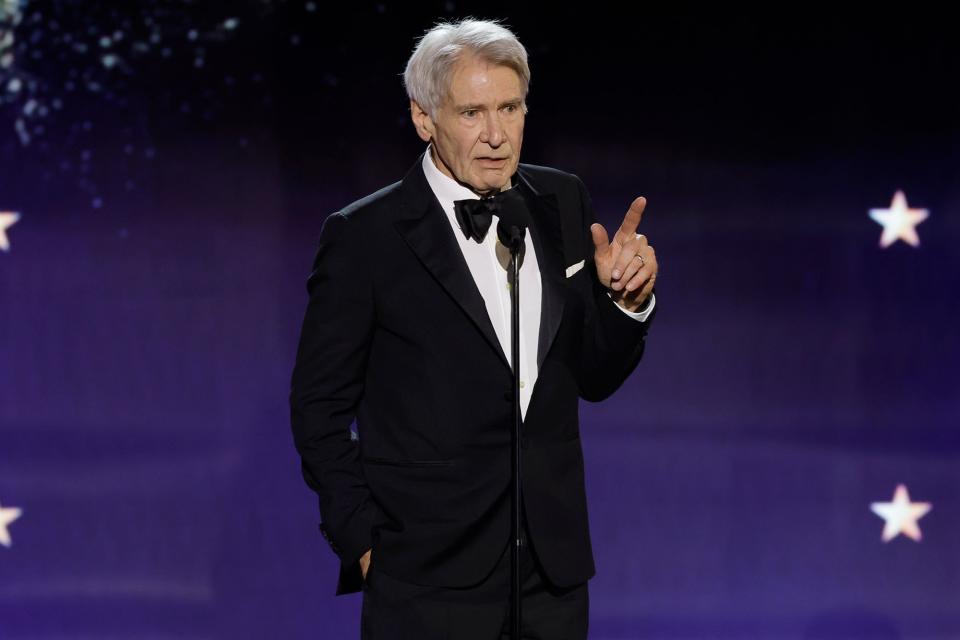 <p>Kevin Winter/Getty</p> Harrison Ford accepted the Career Achievement Award.