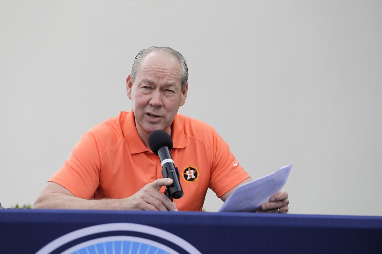 Houston Astros owner Jim Crane speaks during a news conference.