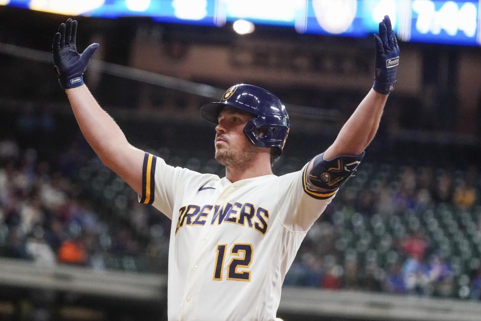 Milwaukee Brewers' Hunter Renfroe reacts after hitting an RBI single during the third inning of a baseball game against the St. Louis Cardinals Wednesday, Sept. 28, 2022, in Milwaukee. (AP Photo/Morry Gash)