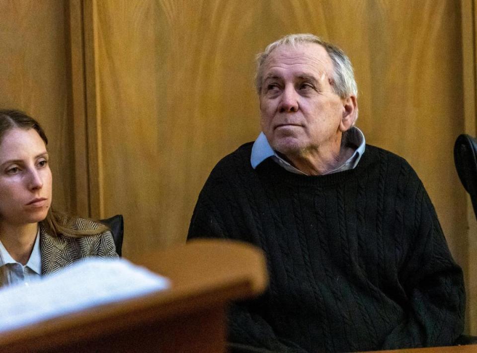 Robert Koehler gazes up at the courtroom’s clock as his attorney Vivian Pitchik listens to the prosecution’s final arguments during his criminal trial on Jan. 25, 2023, before Judge Daryl Trawick at the Richard E. Gerstein Justice Building in Miami.