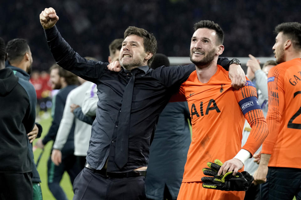 Mauricio Pochettino celebrates with Hugo Lloris after Spurs reach Champions League final (Photo by Soccrates/Getty Images)