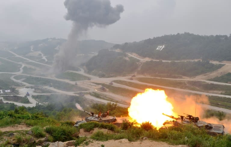 A South Korean K1A1 tank fires live rounds during a joint live-firing drill with the US, at the Seungjin Fire Training Field in Pocheon, north-east of Seoul, in 2012