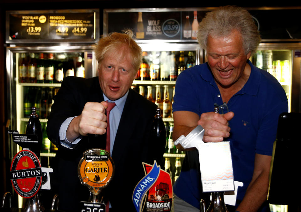 Conservative Party leadership candidate Boris Johnson during a visit to Wetherspoons Metropolitan Bar in London with Tim Martin, Chairman of JD Wetherspoon.