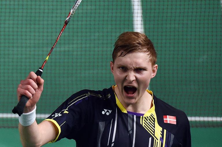 Denmark's Viktor Axelsen celebrates his victory against countryman Jan O Jorgensen during their men's singles semi-final match at the Australian Open badminton tournament on May 30, 2015