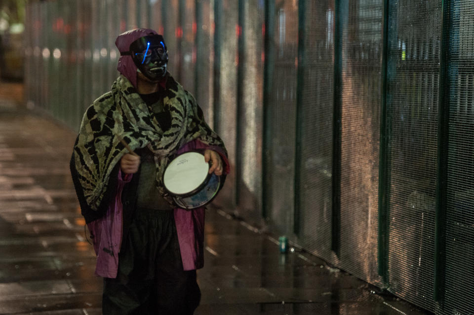 LONDON, ENGLAND FEBRUARY 5: A man hits a drum in support of protesters in the tunnel late at night on February 5, 2021 in London, England. Earlier this week a High Court Judge told HS2's national eviction team to reassess its strategy for evicting the HS2 Rebellion as they risked burying the protestors in their self-constructed tunnels. The Judge also ordered the protestors to stop tunneling. (Photo by Guy Smallman/Getty Images)