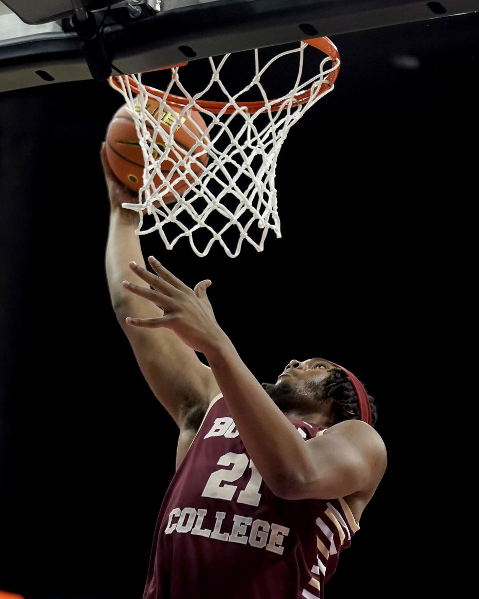 Boston College forward Devin McGlockton puts up a shot during the first half of an NCAA college basketball game against Loyola Chicago Thursday, Nov. 23, 2023, in Kansas City, Mo. (AP Photo/Charlie Riedel)