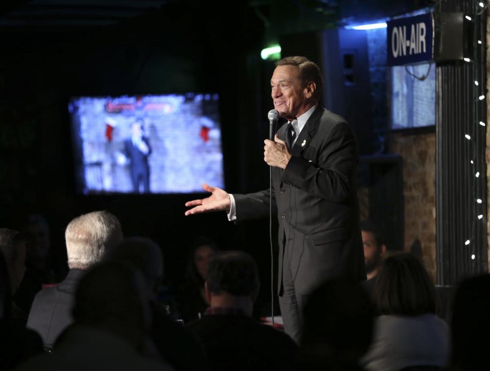 FILE - In this Wednesday, Dec. 7, 2016 file photo, actor, comedian and radio host Joe Piscopo addresses a gathering during a comedy event to help raise funds for the Boys and Girls Club of America at the Stress Factory Comedy Club in New Brunswick, N.J. Piscopo is serious when he says he's considering a run for New Jersey governor in 2017. (AP Photo/Mel Evans, File)