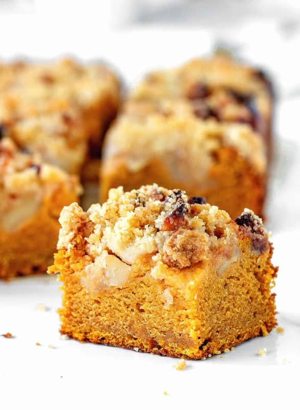 <p>Vintage Kitchen Notes</p><p>This sheet cake combines the best of fall dessert vibes into one easy-peasy sheet cake: super moist pumpkin cake, caramelized apples, all topped by a wonderful streusel with spices.</p><p><strong>Get the recipe</strong>:<a href="https://vintagekitchennotes.com/pumpkin-apple-crumble-cake/" rel="nofollow noopener" target="_blank" data-ylk="slk:Pumpkin Apple Crumb Cake;elm:context_link;itc:0;sec:content-canvas" class="link rapid-noclick-resp"><strong> Pumpkin Apple Crumb Cake</strong></a></p>