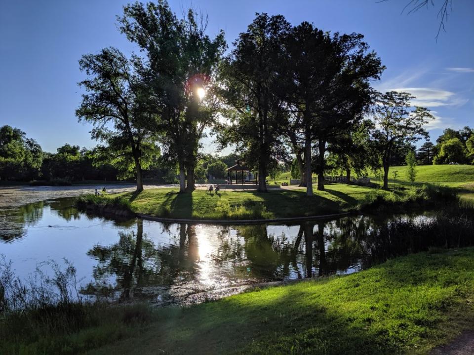 Sunset time in Liberty Park and reflection on a pond in a public park in Salt Lake City, Utah, via Getty Images