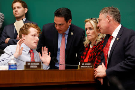 Rep. Joseph Kennedy (D-MA), Rep. Pete Aguilar (D-CA), Rep. Debbie Dingell (D-MI) and Rep. Scott Peters (D-CA) speak during a marathon House Energy and Commerce Committee hearing on a potential replacement for the Affordable Care Act on Capitol Hill in Washington March 9, 2017. REUTERS/Aaron P. Bernstein