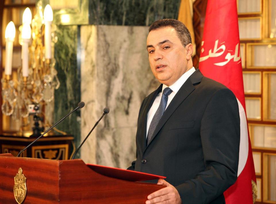 Interim Prime Minister Mehdi Jomaa addresses the media after the new government presentation ceremony at the presidential palace in Carthage near Tunis, Sunday Jan. 26, 2014. Tunisia's interim prime minister announced on Sunday his new government following a 24-hour delay over the post of interior minister. Mehdi Jomaa, the interim prime minister, had been working since Jan. 10 to form a government of technocrats to guide the country to new elections after a political crisis that began last year between Islamists and the opposition following the assassination of an opposition politician. (AP Photo/Hassene Dridi)