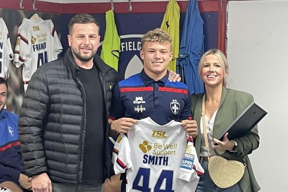 Harvey Smith, who is a student at Brigshaw High School, pictured with his parents following his Rugby League debut (Photo: Contributed)