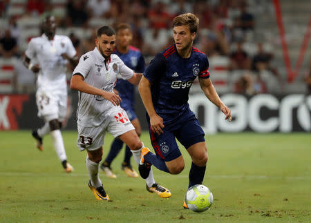 Soccer Football - Champions League - OGC Nice vs Ajax Amsterdam - Third Qualifying Round First Leg - Nice, France - July 26, 2017 Ajax's Joel Veltman in action with Nice's Malang Sarr REUTERS/Eric Gaillard