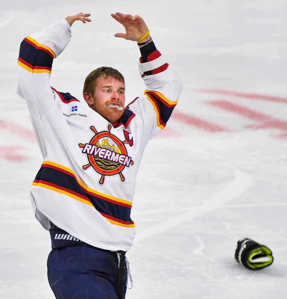 Peoria Rivermen captain Alec Hagaman revs up the crowd after a fight during an SPHL game at Carver Arena in 2019.