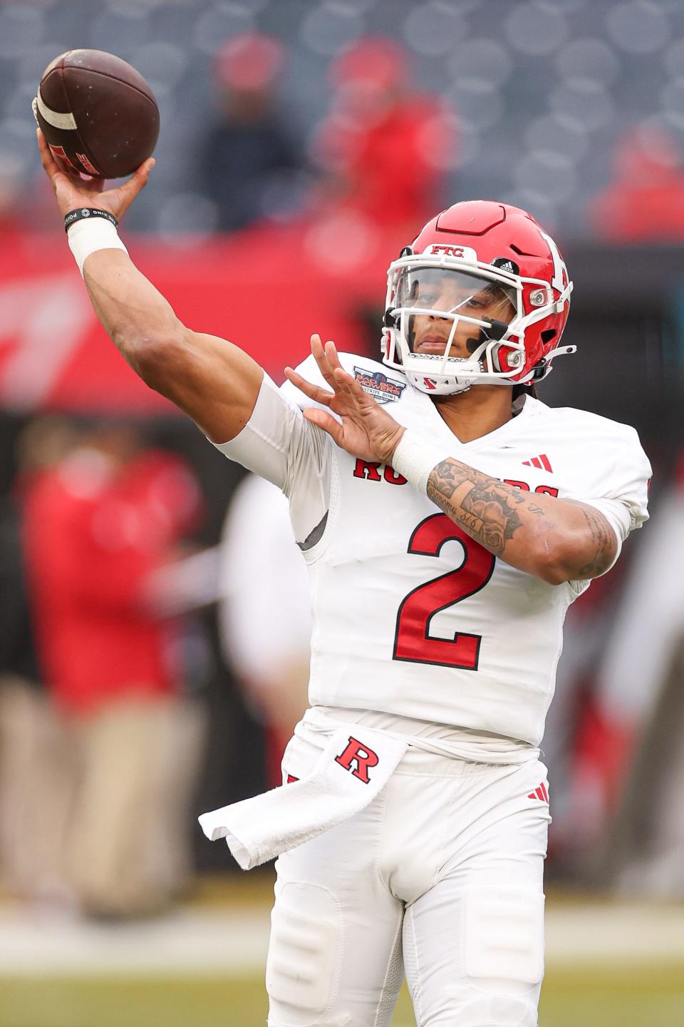 Dec 28, 2023; Bronx, NY, USA; Rutgers Scarlet Knights quarterback Gavin Wimsatt (2) warms up before the game against the Miami Hurricanes at Yankee Stadium. Mandatory Credit: Vincent Carchietta-USA TODAY Sports