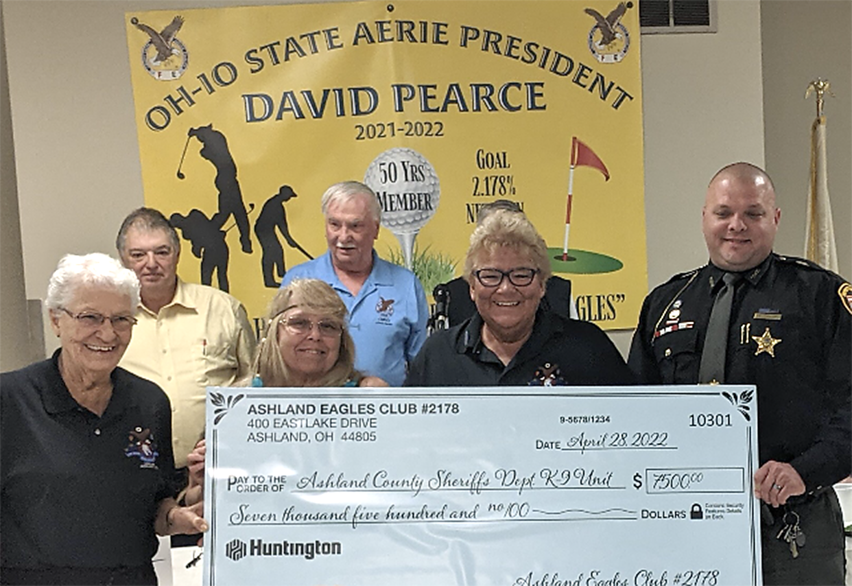 The Ashland Eagles Club donated $7,500 to Shaun Taylor on behalf of the Ashland County Sheriff’s Office K-9 unit, The money will help with more training and supplies for the five K-9 dogs. Trudy Schmidt started this fundraiser with a matching grant. Pictured are, from left, Shirley Jordan, Dorland Davis, Debbie Davis, David Pearce, Schmidt and Taylor.