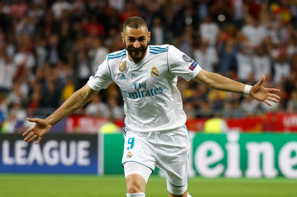 Karim Benzema celebrates scoring the first goal