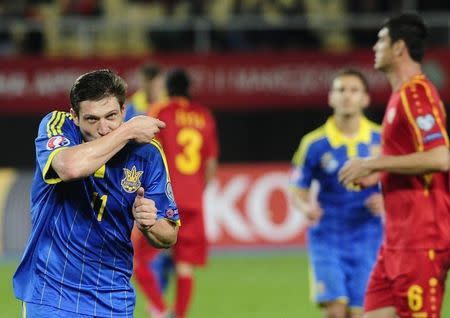 Ukraine's Yevhen Seleznyov (L) celebrates after scoring a goal from the penalty against Macedonia during their Euro 2016 Group C qualification match in Skopje, Macedonia, October 9, 2015. REUTERS/Ognen Teofilovski