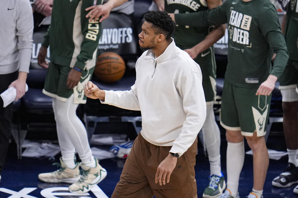 Milwaukee Bucks forward Giannis Antetokounmpo celebrates as the Bucks tied the game at the end of the second half in Game 2 against the Indiana Pacers in an NBA basketball first-round playoff series, Friday, April 26, 2024, in Indianapolis. (AP Photo/Michael Conroy)