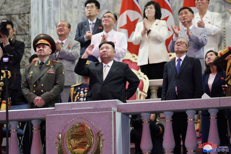 North Korean leader Kim Jong Un presides over a military parade with Sergei Shoigu, Russian minister of defense, and Chinese politburo member Li Hongzhong on Thursday in North Korea. Photo courtesy of KCNA/UPI