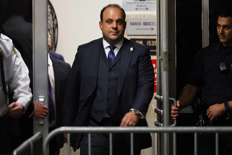 Boris Epshteyn, an aide to former President Donald Trump, returns to the courtroom after a lunch recess during Trump's trial at Manhattan criminal court before his trial in New York, Friday, April 26, 2024. (Michael M. Santiago/Pool Photo via AP)