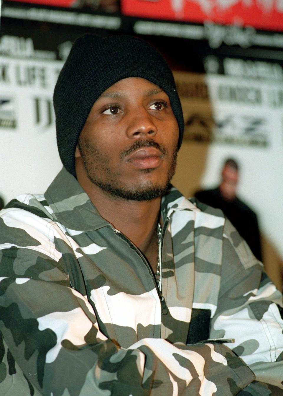 FILE - Rap artist DMX appears at a news conference in New York to announce a 40 city, hard core, hip hop tour, Tuesday, Jan. 26, 1999. The family of rapper DMX says he has died at age 50 after a career in which he delivered iconic hip-hop songs such as “Ruff Ryders’ Anthem." A statement from the family says the Grammy-nominated rapper died at a hospital in White Plains, New York, "with his family by his side" after being placed on life support for the past few days. He was rushed to a New York hospital from his home April 2. (AP Photo/Kathy Willens, File)