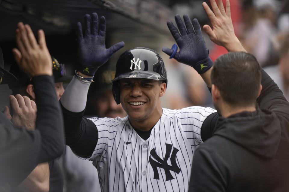 New York Yankees' Juan Soto celebrates with teammates after hitting a home run during the fifth inning of a baseball game against the Chicago White Sox, Saturday, May 18, 2024, in New York. The Yankees won 6-1. (AP Photo/Frank Franklin II)