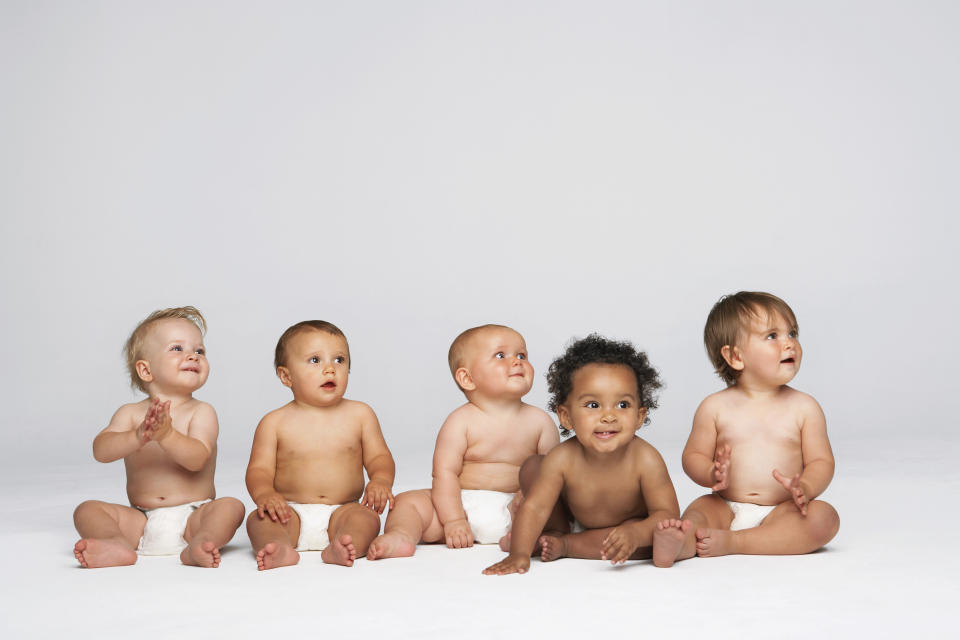 Babies sitting together. (Getty Images)