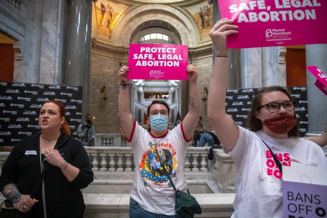 Jace Peters-White of Lexington, center, joined others protesting at the Kentucky state Capitol in Frankfort, Ky., on Wednesday, April 13, 2022. Protesters chanted “Bans off our bodies” as they anticipated Kentucky Gov. Andy Beshear’s veto of a sweepingly restrictive abortion bill, HB3, would be overridden.