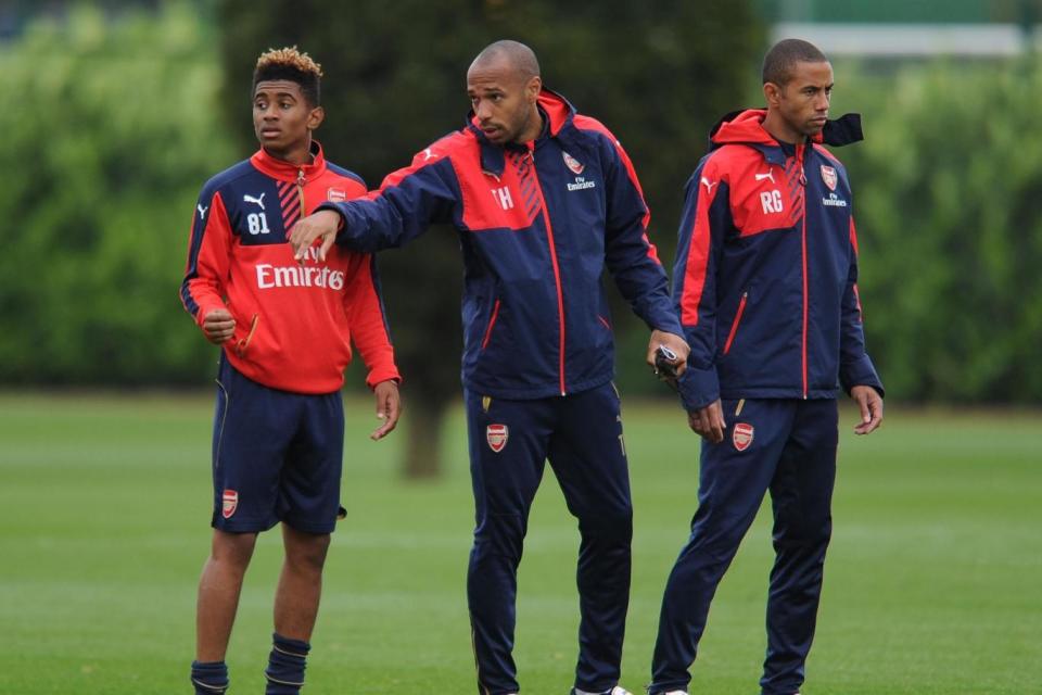 Nelson (left) revealed that Henry had a big impact in such a short time as his coach (Arsenal FC via Getty Images)