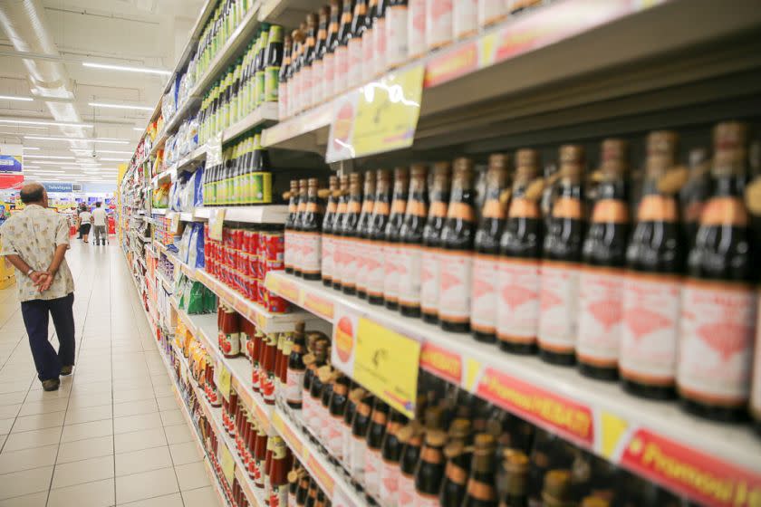 Rows of neatly stacked products are seen in a supermarket. PAS MP Siti Zailah Mohd Yusoff said the proposal for a ban of the jawi script on the packaging of non-Muslims’ products should be considered as the writing system has allegedly been misused to deceive consumer. — Picture by Choo Choy May