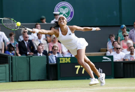 Heather Watson of Britain hits a shot during her match against Serena Williams of the U.S.A. at the Wimbledon Tennis Championships in London, July 3, 2015. REUTERS/Suzanne Plunkett