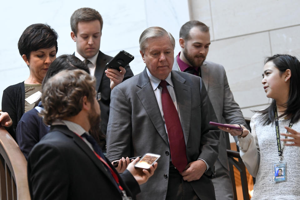 Sen. Lindsey Graham, R-S.C., is followed by reporters as he heads to a closed-door briefing on Capitol Hill in Washington, Monday, March 4, 2019, on the global Magnitsky Act investigation related to the killing of journalist Jamal Khashoggi. (AP Photo/Susan Walsh)