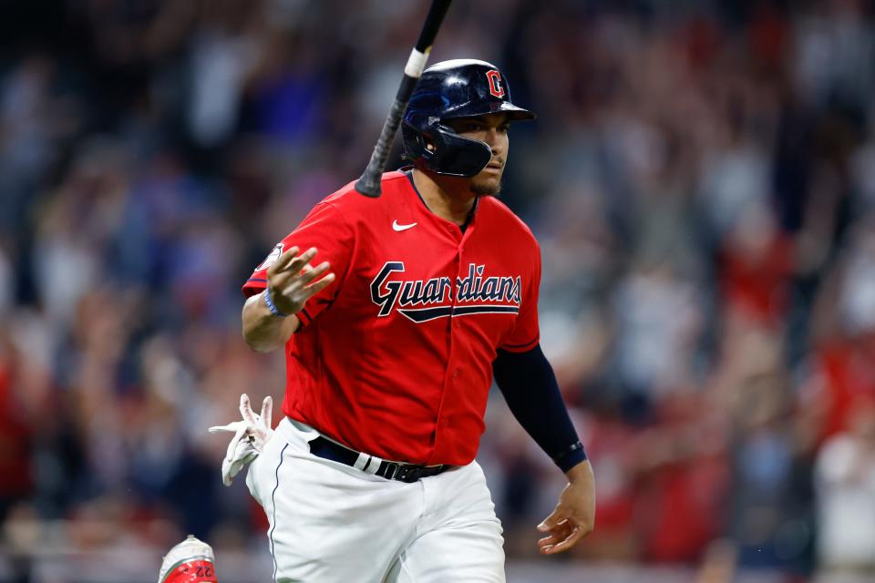 Cleveland Guardians' Josh Naylor tosses his bat after hitting a game-winning, two-run home run against the Minnesota Twins during the 10th inning of a baseball game Wednesday, June 29, 2022, in Cleveland. (AP Photo/Ron Schwane)