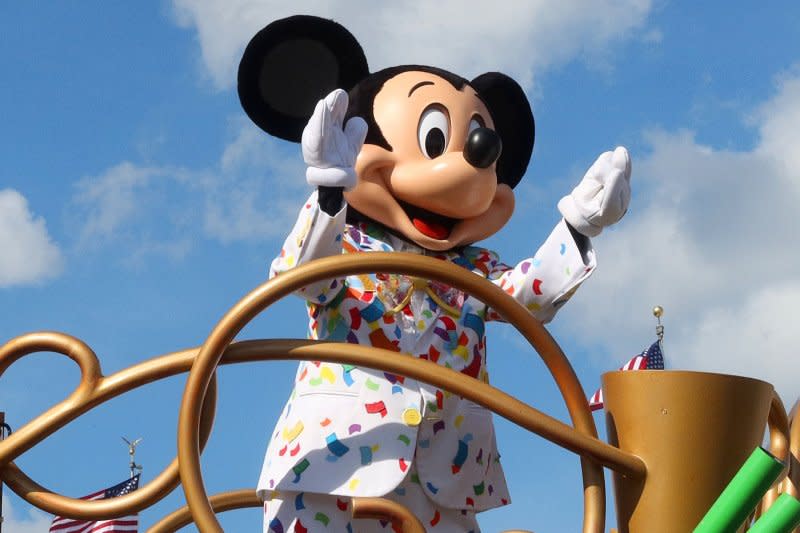 Mickey Mouse moves down Main Street near Cinderella Castle in 2021 in Orlando, Fla. File Photo by John Angelillo/UPI