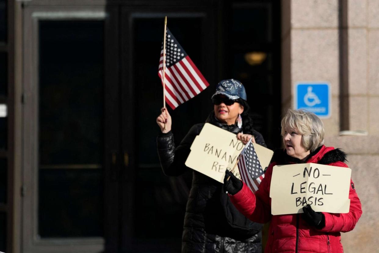 PHOTO: Trump supporters hold signs outside the Minnesota Judicial Center, Nov. 2, 2023, in St. Paul, Minn. (Abbie Parr/AP)
