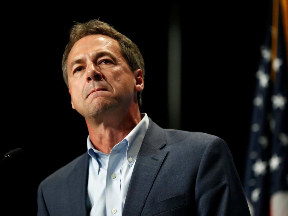 Steve Bullock has been running for president for roughly a month and a half, but even with early setbacks to his 2020 campaign, the Montana governor says he would not take a do-over if one was offered.With a polling average just a smidgen above zero, Mr Bullock will be notably absent from the first Democratic debate stage this week in Miami. While other US governors in the race, as well as a couple of mayors, duke it out with the top brass of the presidential primary on NBC’s prime time, the governor of America’s 41st state and his team are left scrounging for attention.Even so, Mr Bullock says he has no regrets about the flailing polls, or his decision to put off entering the race until so late in the spring — a decision the Democrat made in order to help pass a series of legislative priorities in a statehouse controlled overwhelmingly by Republicans.It’s that decision, in fact, that the 53-year-old said shows he has something nobody else can offer, even in the crowded and historically diverse primary field that 2020 has become.“I’m the only one in the field that actually won in a Trump state,” Mr Bullock said, illustrating his argument that he has what it takes to attract attention from voters who aren’t enchanted by Washington Beltway political gossip: Donald Trump won Montana in 2016 by 20 per cent over Hillary Clinton, while Mr Bullock beat his rival that year by 4 per cent.“I bring a perspective outside of Washington, DC, which I think helps,” he continued. “Because, in time, DC has become a place where talking has become the substitute for actually getting things done. And, as a governor, I don’t have that luxury.”Even with the late entrance into the race, Mr Bullock said he barely missed the cut for this week’s debates in Miami.With a record-setting two dozen contestants, the debate stages were always going to be crowded, and this year the Democratic National Committee (DNC) cut the qualifiers down into two groups of 10. In order to qualify, those contestants needed to receive at least 1 per cent support in three separate polls honoured by the DNC, or to receive donations from 65,000 unique donors spread out in at least 20 states.The Montana governor nearly made the first criteria, only to find out that one of three surveys showing his support at 1 per cent was disqualified. He now claims he has met the requirements to make the second debate stage next month in Detroit.Instead of campaigning earlier in the year like some front-runners who have managed to make a big splash — or, even like some candidates who are still virtually unknown — Mr Bullock said he was engaged with the Republican-controlled legislature in Montana, where they pushed forward on a Medicaid reauthorization, and passed sweeping campaign finance legislation in the state that would effectively eliminate so-called “dark money” in the state.“Look, I only got into this race a little bit over a month ago, because I had a job to do,” he said. “My legislature meets 90 days every two years. And, I had to save healthcare for 100,000 Montanans.”“So, truly had I gotten in earlier, I think all of that would have been at risk,” Mr Bullock said of the efforts in Helena, before highlighting that he failed to attract the 65,000 unique donors to his campaign. “If I had to choose between providing healthcare or saving healthcare for 100,000 people, or chasing 100,000 donors, [it’s the] easiest choice I’ll ever make.”Mr Bullock faces some other, pretty stiff obstacles as he makes his long-shot bid to become the Democratic standard bearer — and missing out on the first debates may be the least of his problems.He faces a crowded Democratic field, and one that includes a historically diverse set of candidates. That’s both in terms of the number of women and minorities running, but also in terms of the range of ideologies on display, from centrists like Joe Biden to the progressives receiving plenty of attention like Bernie Sanders and Elizabeth Warren.With that long list of competition in mind, Mr Bullock pushed back at the notion that he should have stayed out of the race and made a case to Montanans that they should elect him as a US Senator — an important arm of Congress that could help determine the success of a Democratic president — and promised to help “do everything that I can to make sure that” a Democrat is elected to that office.When asked, Mr Bullock also defended his record on climate change, an issue that has emerged as an important litmus test in the Democratic primary, with polls consistently showing the issue as one of the most important if not the most important issue among voters.Mr Bullock refused to commit to signing the No Fossil Fuel Money Pledge, but noted that he will not accept donations from corporate donors or PACs.When asked about his cosy relationship with coal mining as governor — he once called Barack Obama “wrong” after the former president pushed to ban new coal leases on federal lands, for instance — Mr Bullock said that he believes markets are already pushing fossil fuels towards being obsolete, and cited Montana’s investment in renewable energy sources like wind turbines.“We have to do something about it,” Mr Bullock said of climate change. “And, if we don’t recognise the Republicans when they turn around and won’t even acknowledge climate change is human caused, that’s in part because of the dynamics of spending.”When Elizabeth Warren, Joe Biden, Bernie Sanders, and the other 17 Democrats who qualified for the debates take stage on Wednesday and Thursday, Mr Bullock plans on taking his pitch directly to the voters in Iowa on the first day, and then New Hampshire the second.Mr Bullock’s plan seems to be fairly straightforward: convince voters that not only is he progressive on issues where it counts, but that he can appeal to the kinds of swing voters who might turn their backs on the president in 2020 and deliver a win to a Democrat.He said that 25 to 30 per cent of the voters in Montana who cast their ballots in his favour in 2016 also supported Mr Trump. And he says that shows how important it is to focus on the ability to get things done.“I wouldn’t have made the decision any differently as far as making sure people are taken care of and I’m excited that I will be qualified for the second debates,” he said. “I look forward to being on stage because ... if you look at this field … it’s important to have a voice like mine on that stage. Someone that’s actually won in a Trump state. Someone who’s gotten government to work, not just talked about.”