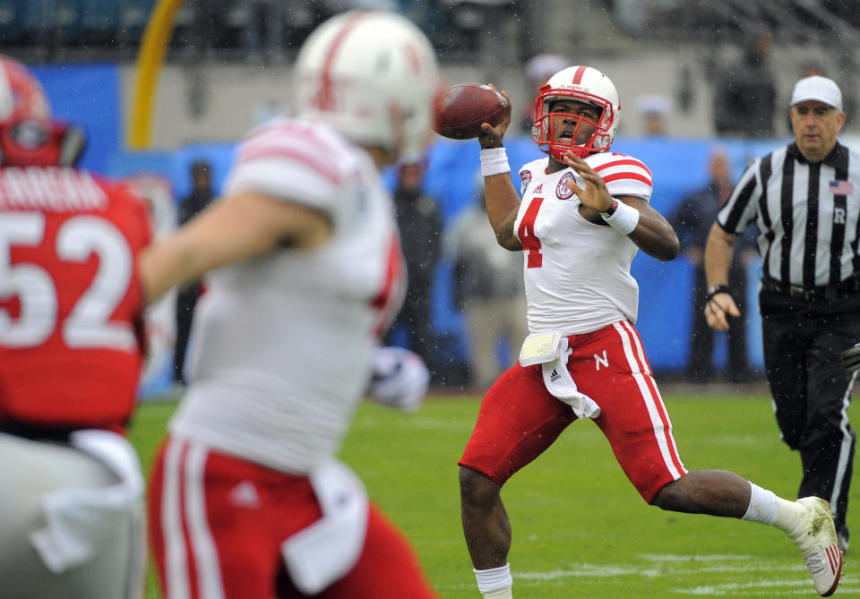 Nebraska quarterback Tommy Armstrong Jr. (4) passes the ball during the first half of the Gator Bowl NCAA college football game against Georgia, Wednesday, Jan. 1, 2014, in Jacksonville, Fla. (AP Photo/Stephen B. Morton)