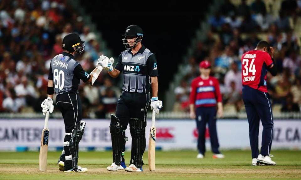 Mark Chapman celebrates with Colin de Grandhomme after securing New Zealand’s place in the final.